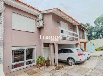 Casa · 240m² · 4 Quartos · 2 Vagas · Casa em condomínio no bairro Santo Antônio de 4 dormitórios e 2 vagas