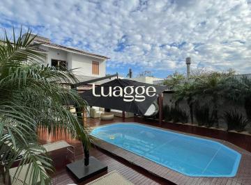 Casa · 220m² · 3 Quartos · 3 Vagas · Casa com Piscina Aquecida e Energia Solar