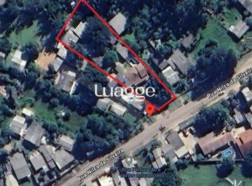 Terreno · 3780m² · 6 Quartos · 3 Vagas · Terreno no bairro Hípica com 3.780m² com 3 casas