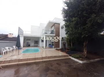 Casa · 328m² · 5 Quartos · 4 Vagas · Casa de 5 dormitórios, piscina e 4 vagas de garagem em Canoas.