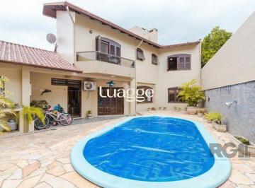 Casa · 295m² · 4 Quartos · 2 Vagas · Casa com 4 dormitórios no bairro Morro Santana