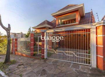 Casa · 297m² · 4 Quartos · 3 Vagas · Casa de 3 quartos, 1 suíte e 3 vagas de garagem em Canoas