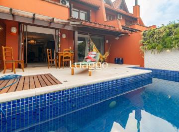 Casa · 329m² · 3 Quartos · 2 Vagas · Casa em condomínio fechado a venda no bairro Três Figueiras.