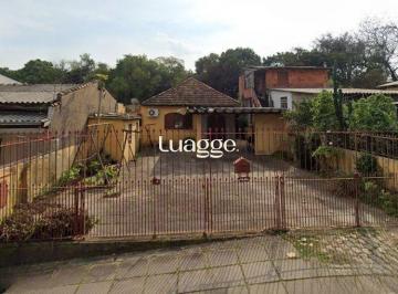 Casa · 70m² · 3 Quartos · 4 Vagas · Excelente imóvel com terreno amplo à venda no Jardim Itu – Porto Alegre