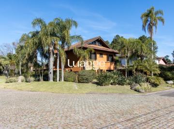 Casa · 385m² · 6 Quartos · 5 Vagas · Casa à venda no Terra Ville com 6 dormitórios e fundo para o lago.