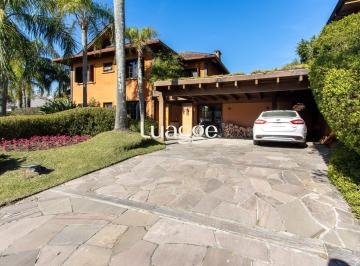 Casa · 385m² · 6 Quartos · 5 Vagas · Casa à venda no Terra Ville com 6 dormitórios e fundo para o lago.