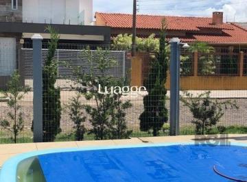 Casa · 170m² · 3 Quartos · 4 Vagas · Casa em Atântida Sul de 3 dormitórios, piscina, 4 Vagas garagem a 2 quadras do m