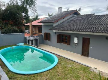 Casa · 156m² · 3 Quartos · 2 Vagas · Casa com 3 Quartos, Suíte, Piscina e Lareira no Condomínio Cantegril Fase 4 em Viamão