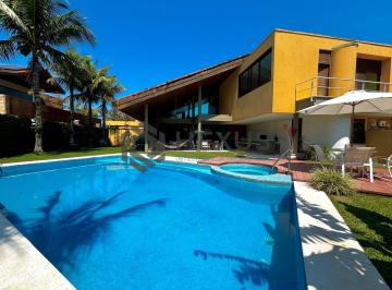Foto · Casa reformada com piscina e área gourmet no Jardim Acapulco, Guarujá
