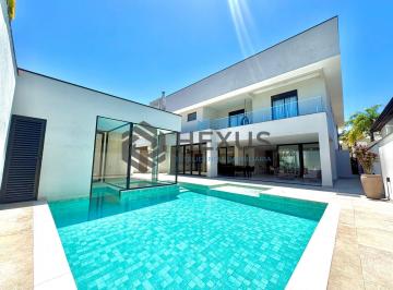 Foto · Casa reformada com piscina e área gourmet no Jardim Acapulco, Guarujá