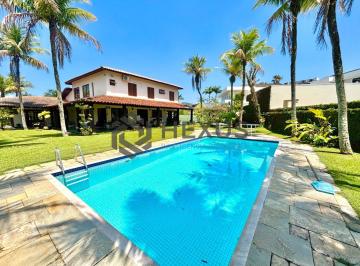 Foto · Casa reformada com piscina e área gourmet no Jardim Acapulco, Guarujá