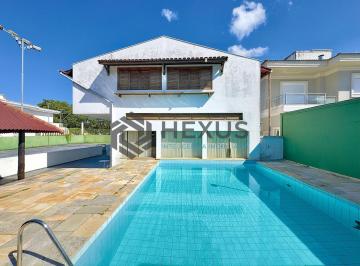 Foto · Casa reformada com piscina e área gourmet no Jardim Acapulco, Guarujá