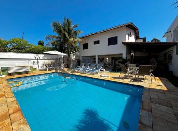 Foto · Casa reformada com piscina e área gourmet no Jardim Acapulco, Guarujá