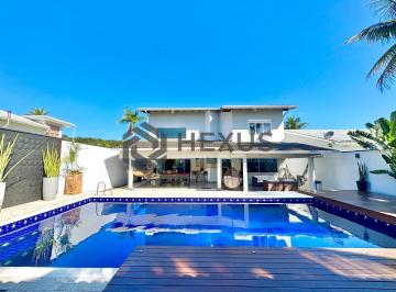 Foto · Casa reformada com piscina e área gourmet no Jardim Acapulco, Guarujá