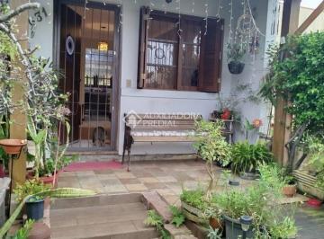 frente · linda casa com 2 dormitórios e quiosque. Dois banheiros. Patio arrumado