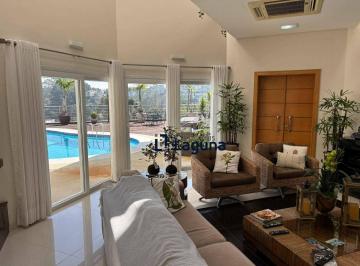 ea1dd2dec68e348a4af5ca360e1b93066de1cf1b · Casa à venda no Condomínio Swiss Park com 5 suítes, sala 3 ambientes, academia, piscina, espaço gour