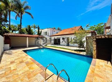 Foto · Casa reformada com piscina e área gourmet no Jardim Acapulco, Guarujá