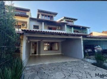 Casa · 280m² · 3 Quartos · 2 Vagas · VILLARINHO VENDE LINDA E AMPLA CASA COM 3 DORMITÓRIOS + GABINETE EM IPANEMA (PO