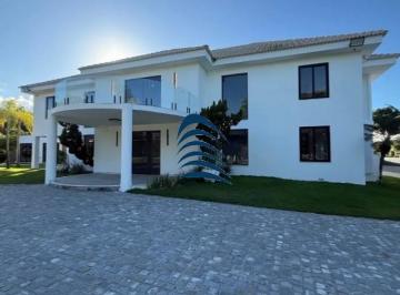 Foto 01 · Casa de alto padrão no Condomínio Encontro das Águas, com aproximadamente 1.200m² de área construída