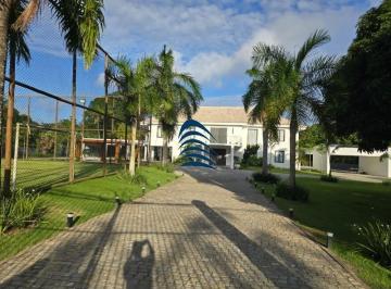 Foto 34 · Casa de alto padrão no Condomínio Encontro das Águas, com aproximadamente 1.200m² de área construída
