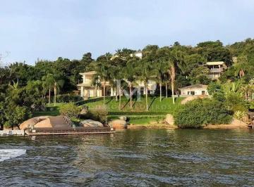sobrado-com-5-quartos-a-venda-1200m-no-lagoa-da-conceicao-florianopolis-17839690215565.webp · Casa de frente para a Lagoa da Conceição com 5 suítes em Florianópolis