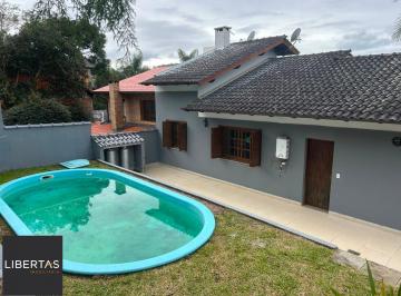 Casa · 156m² · 3 Quartos · 2 Vagas · Casa com 3 Quartos, Suíte, Piscina e Lareira no Condomínio Cantegril Fase 4 em V