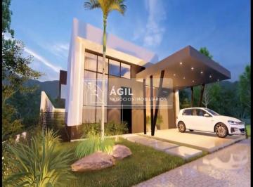 Foto 01 · Linda casa térrea com 156m² 3 suítes - Reserva do Aruanã