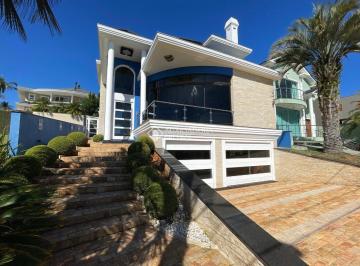 Casa · 600m² · 6 Quartos · 4 Vagas · Exclusividade, imponência e sofisticação no Alphaville Gravataí.