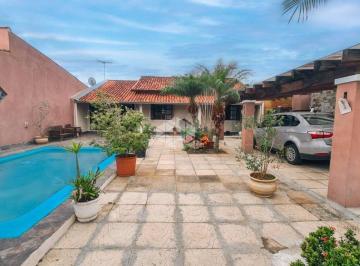 Photo 1 · Casa 3 dormitórios com closet, piscina e churrasqueira em Gravataí.