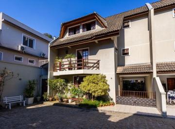 sehtppc2ytu3zmq2zdjhyty5_md · Sobrado impecável à venda no Tarumã, na divisa com o Jardim Social