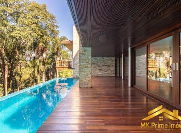 Casa · 3300m² · 4 Quartos · 10 Vagas · Mansão no Tamboré 1 | Integração Perfeita com a Natureza
