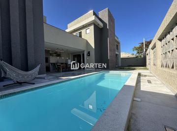 Casa · 156m² · 4 Quartos · 3 Vagas · Sobrado quadra mar com 4 suites e Piscina no Balneário Praia Grande