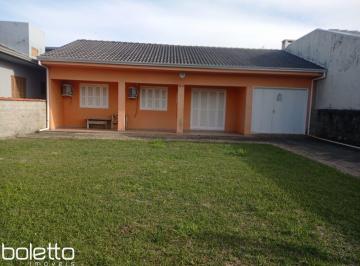 Frente casa · Casa 3 Dormitórios com Garagem na Praia Paraíso – Torres/RS