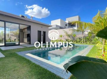 Casa · 255m² · 3 Quartos · 4 Vagas · Espetacular casa nova à venda no Condomínio Alphaville 1, em Uberlândia!
