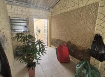 Casa · 104m² · 2 Quartos · 2 Vagas · Espaçosa Casa Geminada à Venda no Maracanã, Praia Grande - 2 Quartos