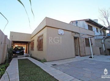 Photo 1 · Casa no bairro Cavalhada de 3 dormitórios e amplo pátio