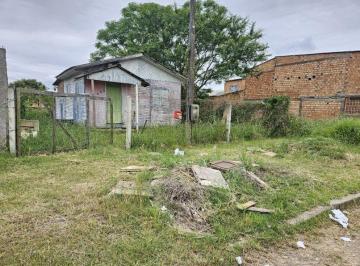 Photo 1 · Terreno plano com Casa em Madeira 2d, 1Banh, Restinga, Porto Alegre