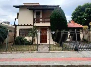 Casa · 130m² · 3 Quartos · 2 Vagas · Auxiliadora Predial aluga Excelente casa com 3 quartos, sendo 1 suíte no bairro Carianos