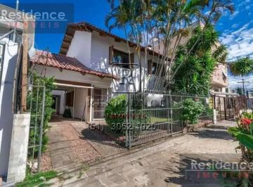 Foto 01 · Aluguel de Casa Espaçosa com 3 Quartos e 4 Vagas de Garagem em Santana, Porto Alegre-RS