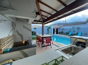 Foto 1 · Casa à venda no Balneário Flórida em Praia Grande – 4 dormitórios, piscina, área gourmet e porteira