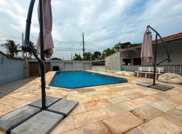 Foto 1 · Casa com piscina em Praia Grande
