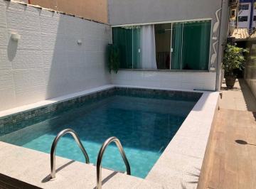 Foto 1 · casa com 3 quartos 1 suite, sala ampla, piscina, churrasqueira próximo da Praia.