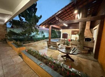 Foto 1 · Casa à venda em Mongaguá no Balneário Flórida Mirim, 3 dormitórios, área gourmet, amplo terreno e 40