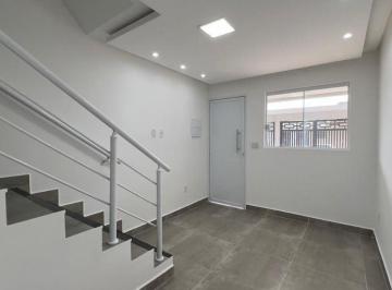 Foto 1 · Sobrado à venda no Caiçara, Praia Grande – 2 dormitórios, garagem privativa e entrada individual a 2