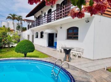Foto 1 · CASA ESPAÇOSA COM 3 SUÍTES, CLOSET, PISCINA, EDÍCULA COMPLETA E GARAGEM PARA 5 CARROS