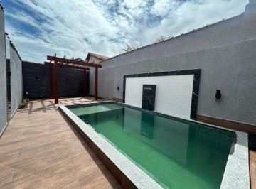 Foto 1 · Casa 2 dormitórios com piscina na Aviação - Praia Grande, SP