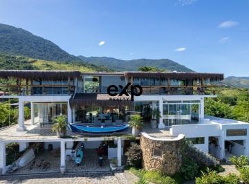 Casa · 380m² · 6 Quartos · 10 Vagas · Linda casa em condomínio à venda em Ilhabela