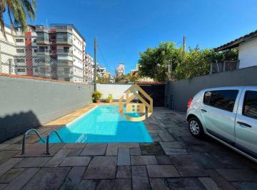 ad05f796b0d755a2f6de8596f452dc3a66a28850 · Casa com 3 dormitórios à venda por R$ 670.000,00 - Praia da Enseada - Guarujá/SP