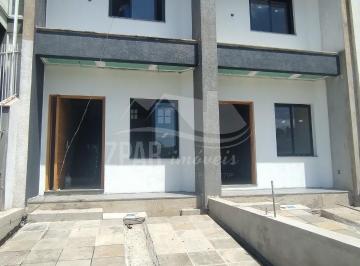 Foto 02 · Sobrado de 2 suítes no residencial Lagos de Nova Ipanema na Hípica: conforto e praticidade em Porto 