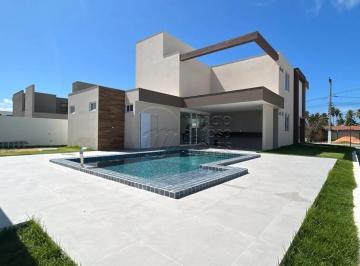 Casa · 360m² · 4 Quartos · 4 Vagas · Casa Nascente com 4 Suítes e Piscina à Venda no Cond. Residencial Ilha da Lagoa
